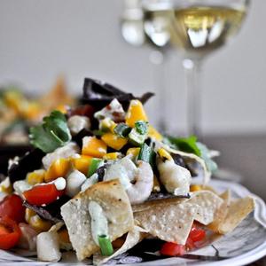 Summertime Seafood Nachos With Grilled Corn + Avocado Cream