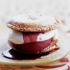 Macaroon Sandwiches with Poached Pears and Devon Cream